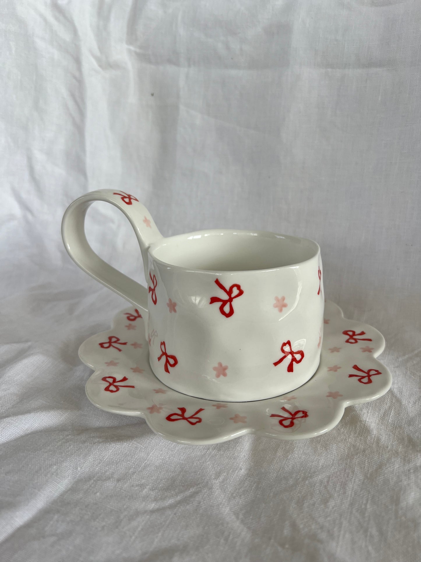 Joyeaux Noel Ceramic Cup and Saucer