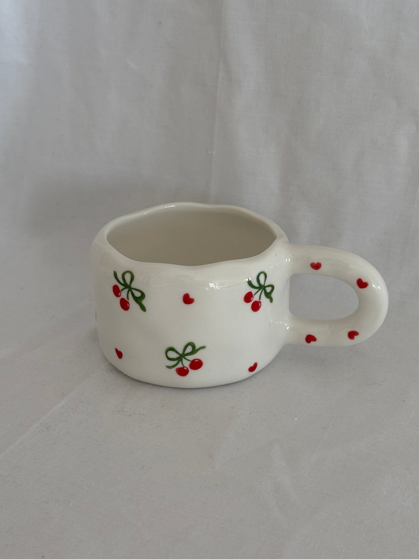Cerises de Noël Ceramic Cup and Saucer
