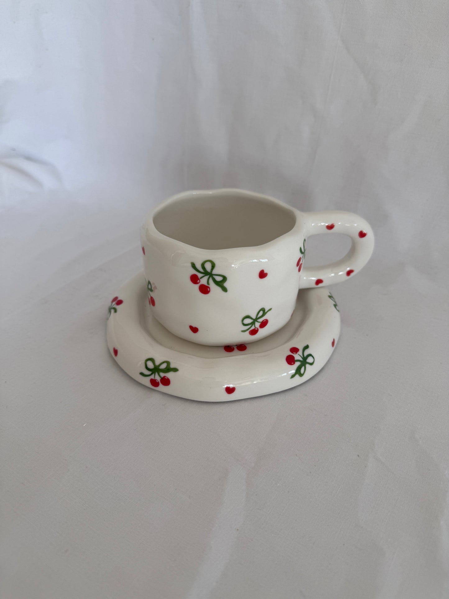 Cerises de Noël Ceramic Cup and Saucer