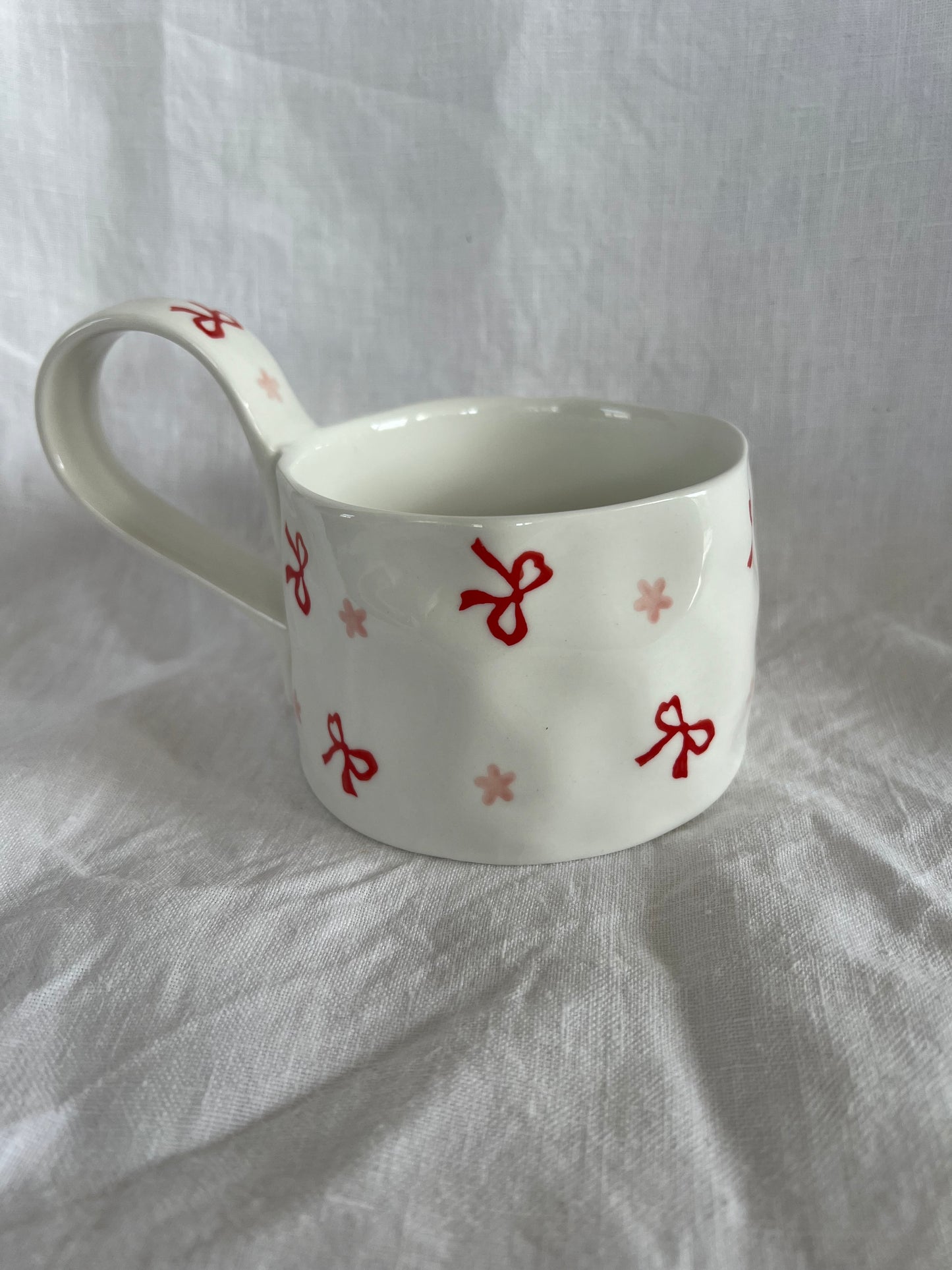 Joyeaux Noel Ceramic Cup and Saucer